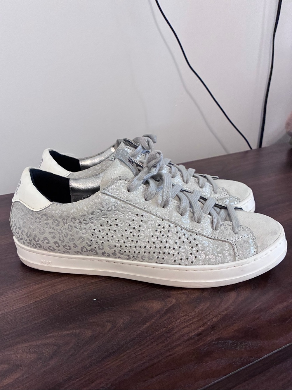 P448 metallic gray sneakers
